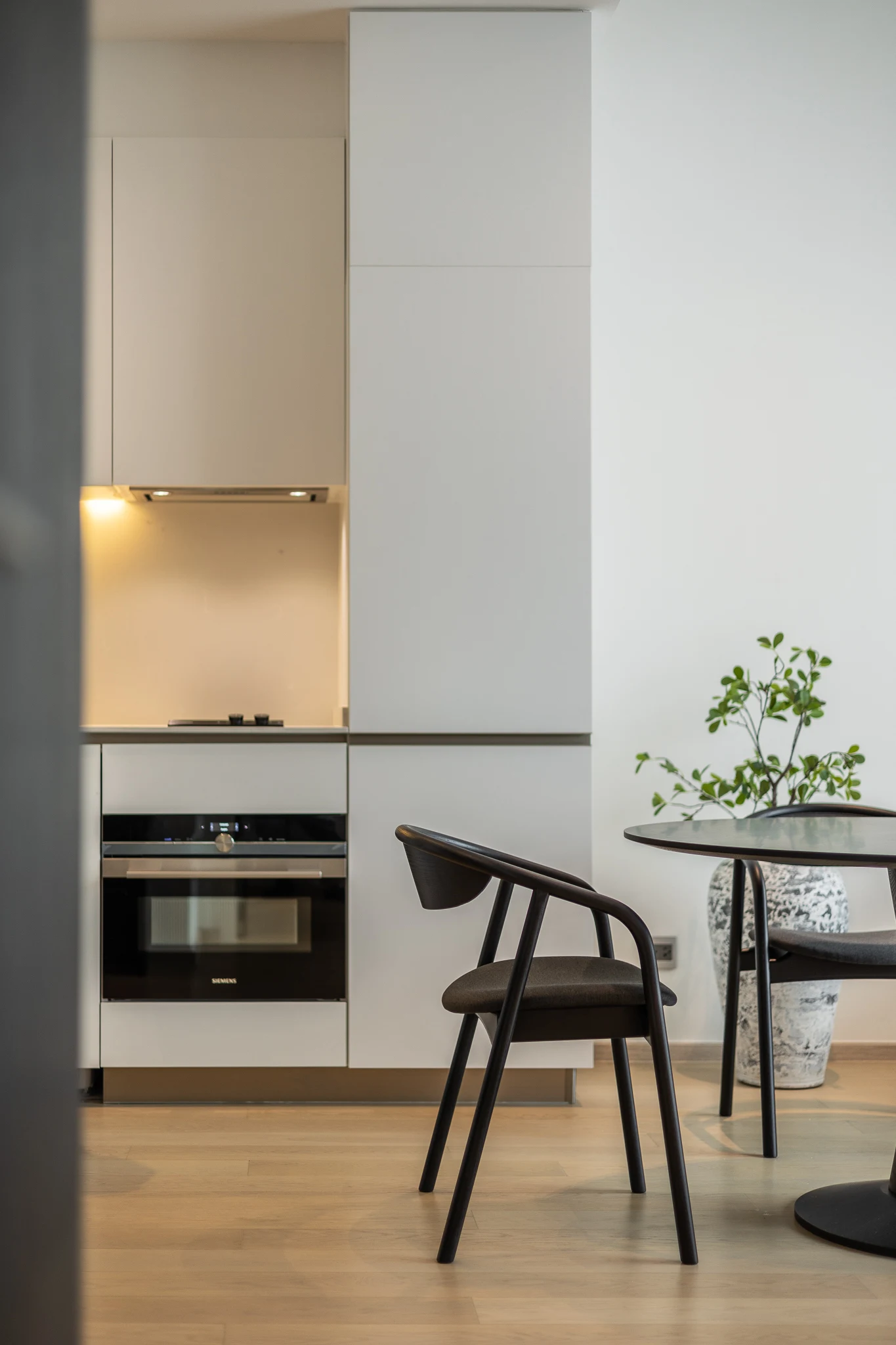 The Strand Thonglor — Warm Layered Residence